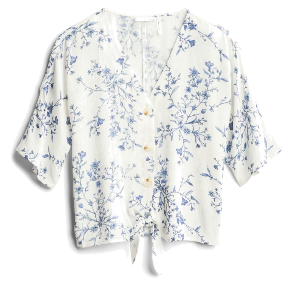 LUQ brand. Front tie blouse with short bell sleeves.